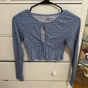 Blue stylish long sleeve shirt with cut out.